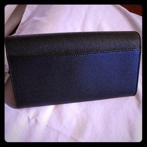 New black coach full size wallet.